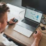 Freelancer Management Platform Explained: performance analytics graphs and charts on a laptop showing contractor spend visibility.