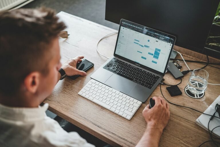 Freelancer Management Platform Explained: performance analytics graphs and charts on a laptop showing contractor spend visibility.