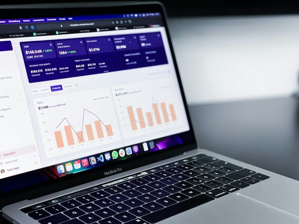 Open laptop on a desk, representing cash flow forecasting software a freelancer might use