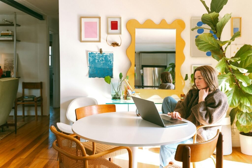 Freelancer working at a laptop in a focus session using a distraction-blocking app