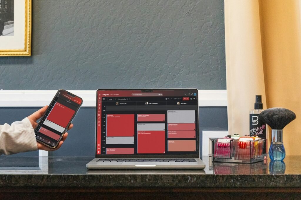 Smartphone and laptop displaying a planning app interface for time-blocking the week