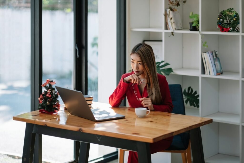 Freelancer building a Google Sheets invoice template with auto-calculating formulas