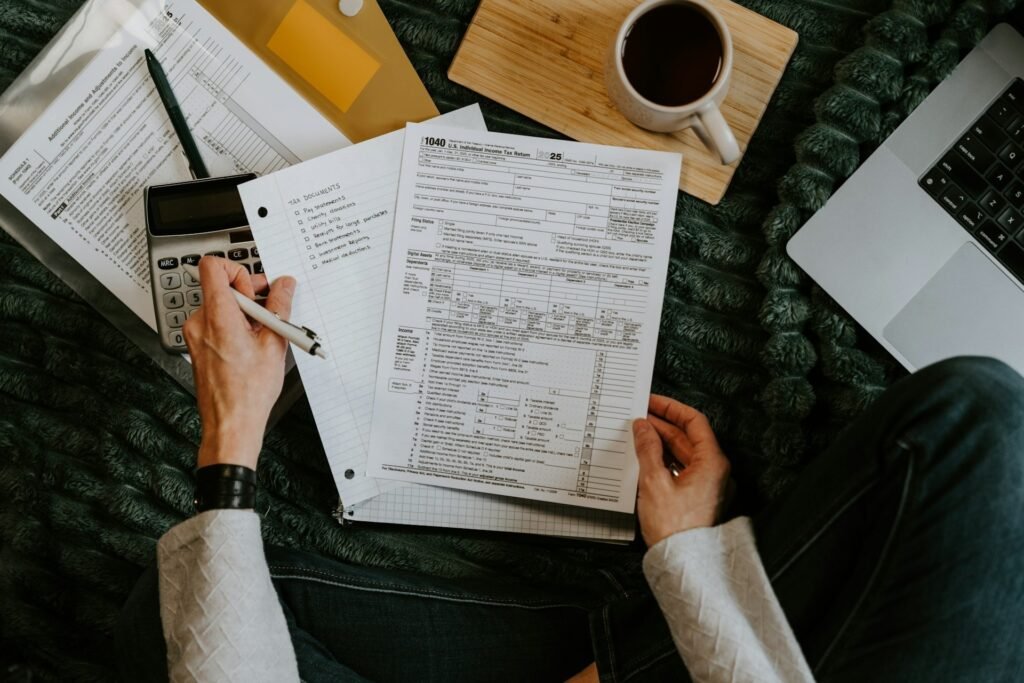 Expense tracking template for tax preparation with a 1040 form, calculator and checklist